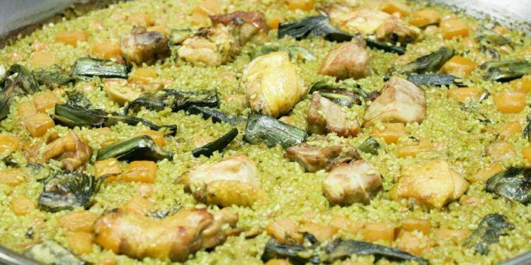 Arròs de Sant Vicent de Guadassuar, receta de un arroz seco con calabaza, alcachofas y naranja
